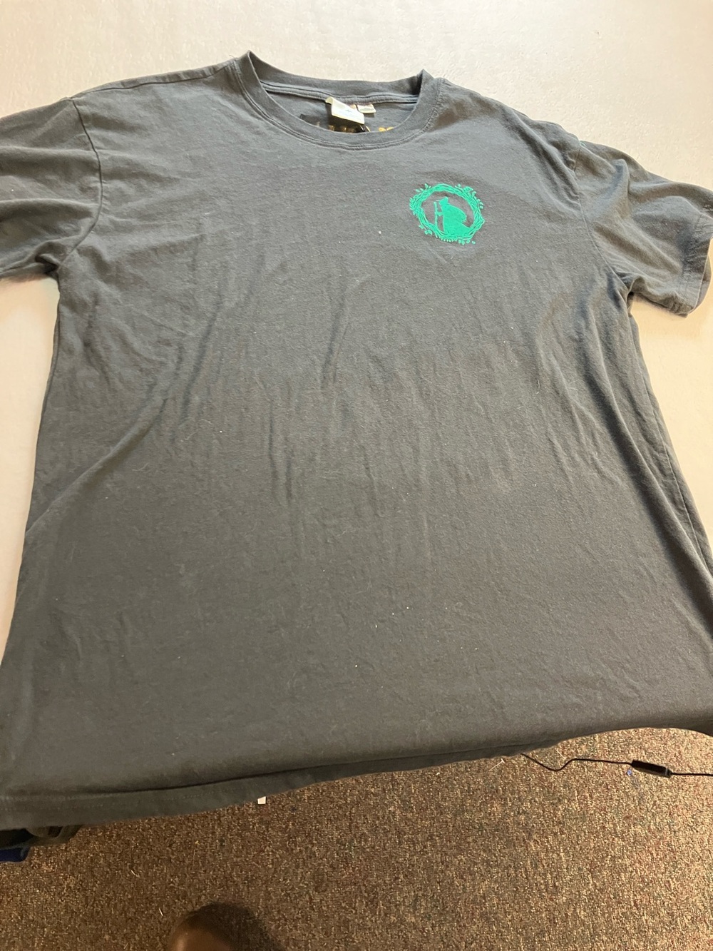 Universal Men's Dark Gray Short Sleeve Tee with Green Chest Logo